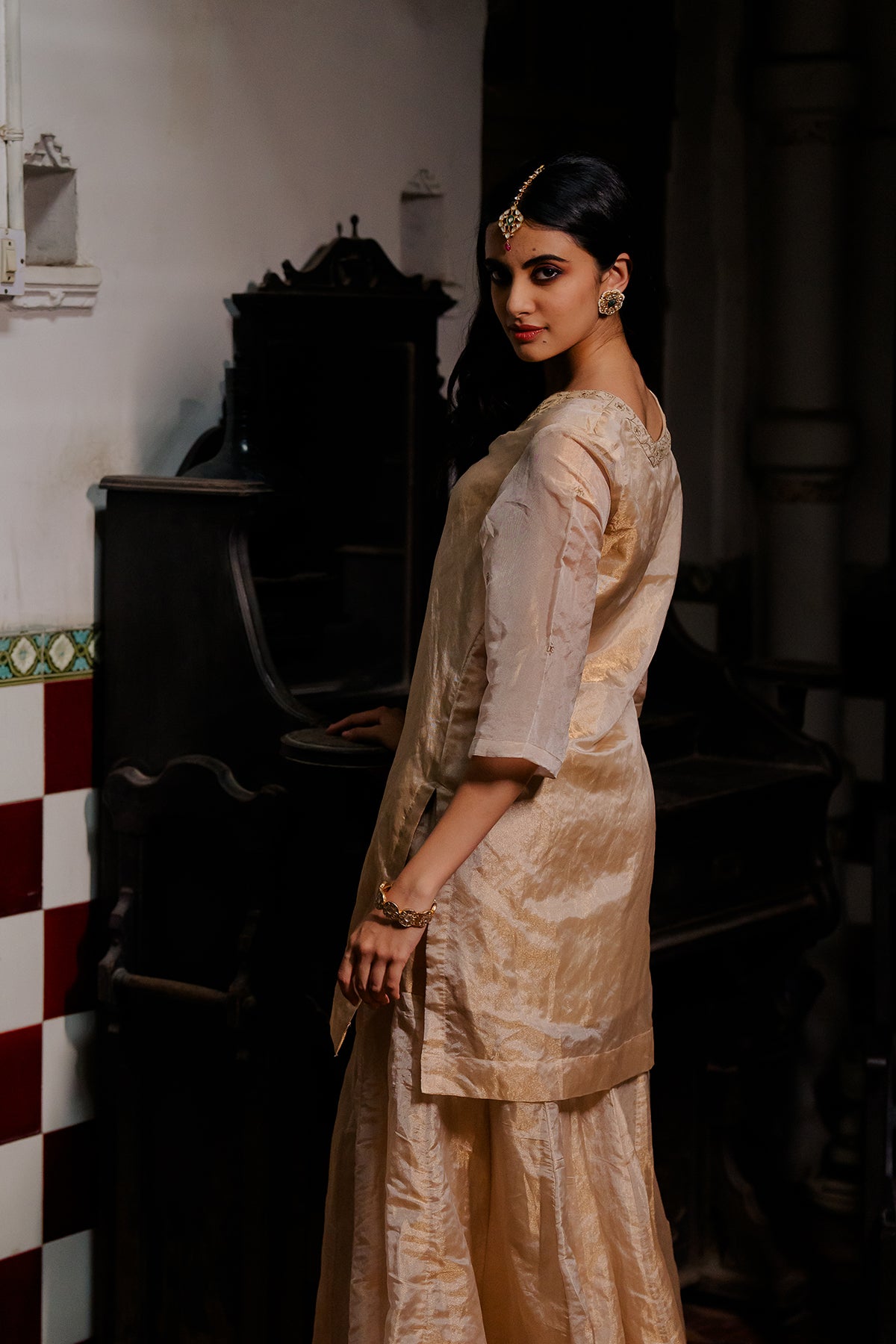 Roohi Tissue V- neck short kurta with sharara - Gold