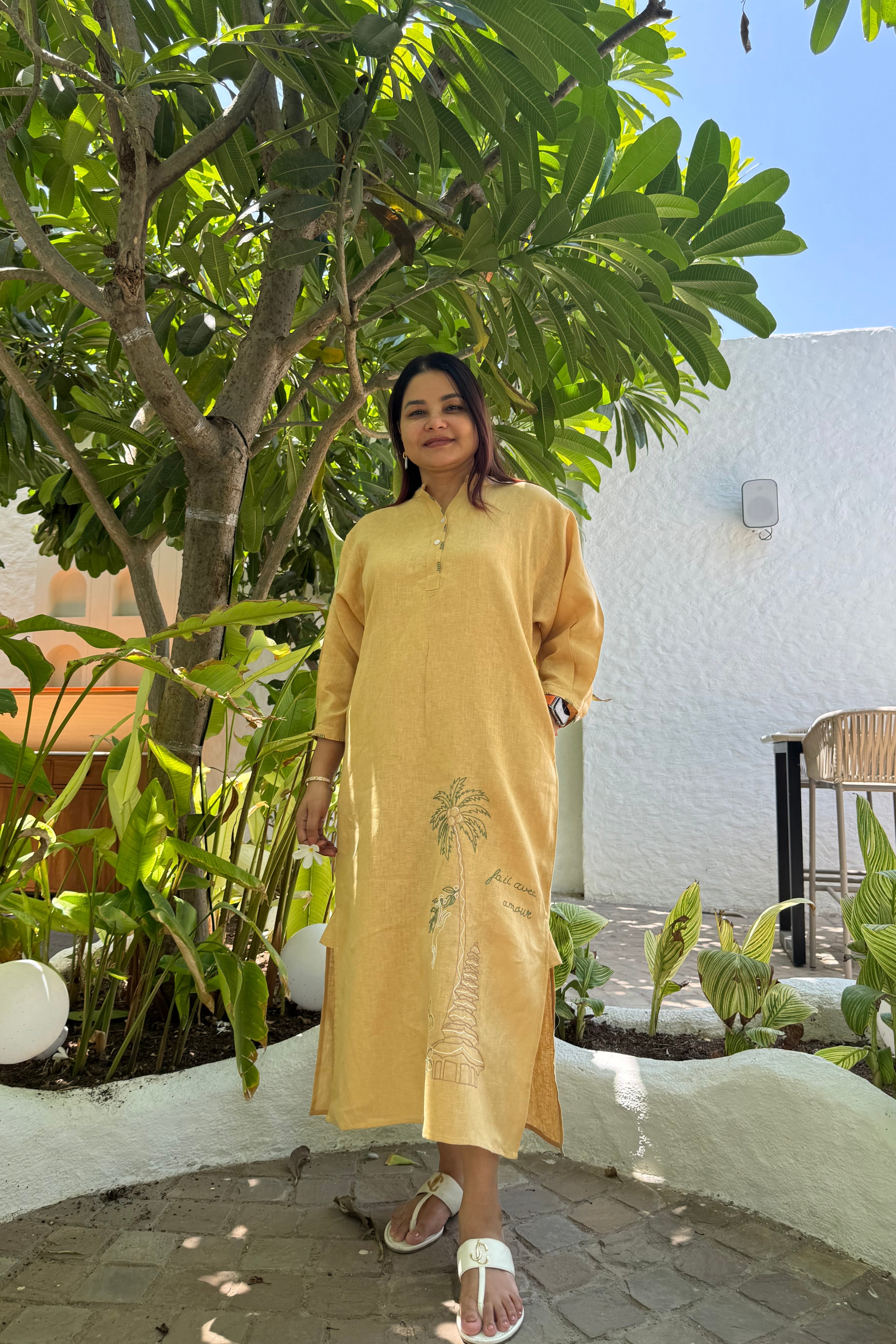 Women wearing 100% pure linen half placket dress in daisy yellow